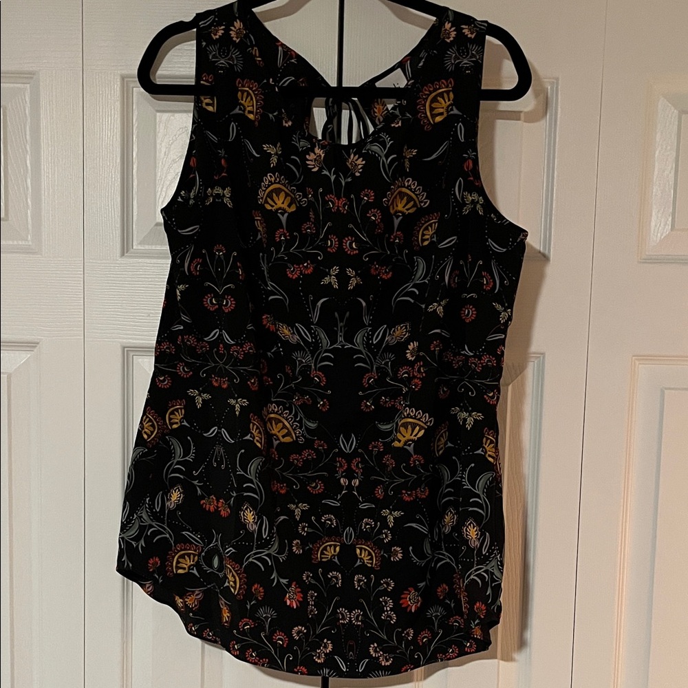 CAbi Black Sleeveless Top with Floral Design